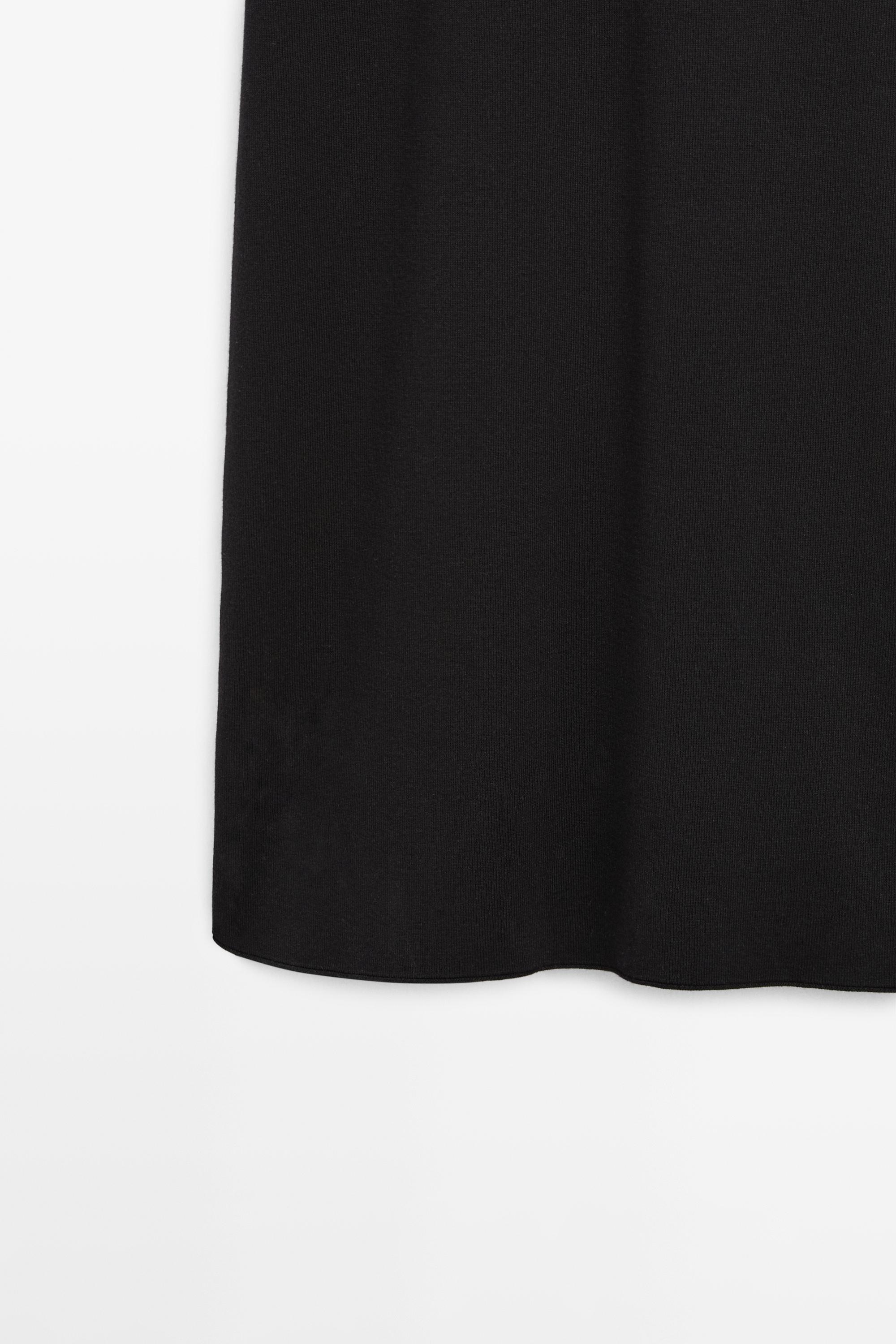 Robe midi détail manches